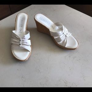 White wedge sandals.